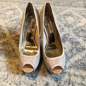 Jennifer Lopez open toe heels.